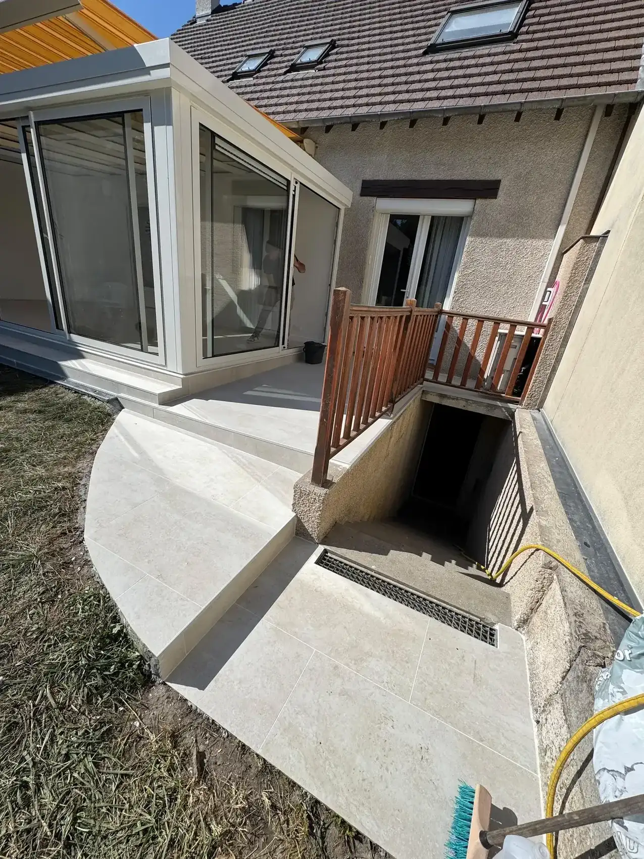 Véranda et terrasse en béton réalisées par DD Design