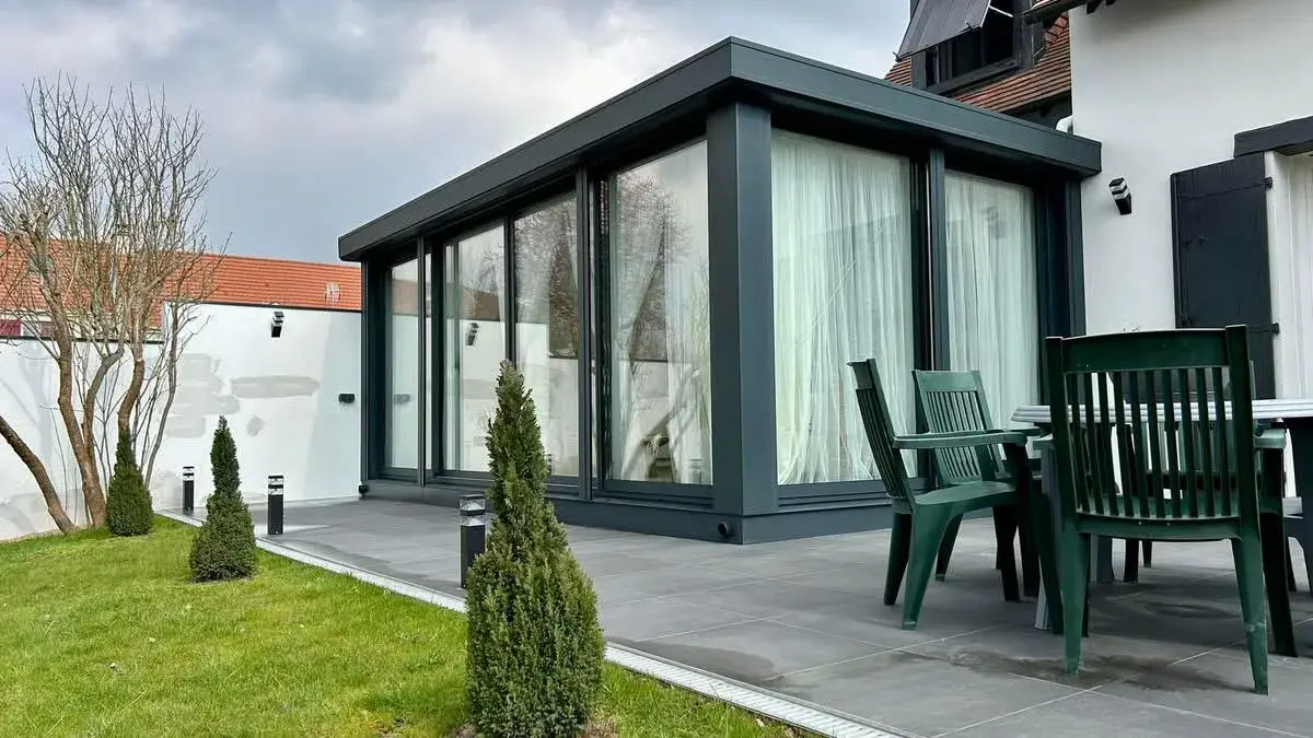 Véranda aluminium et terrasse